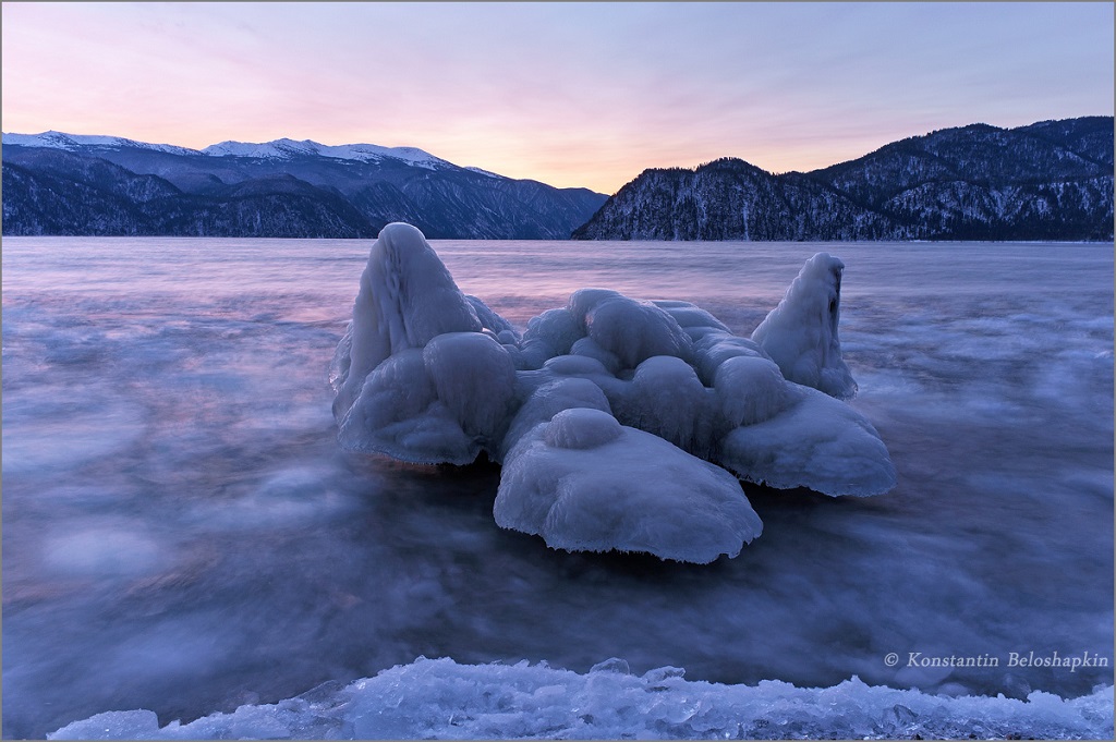 Altai Mountains, Lake Teletskoye near the village Yaylu. Dawn, January
