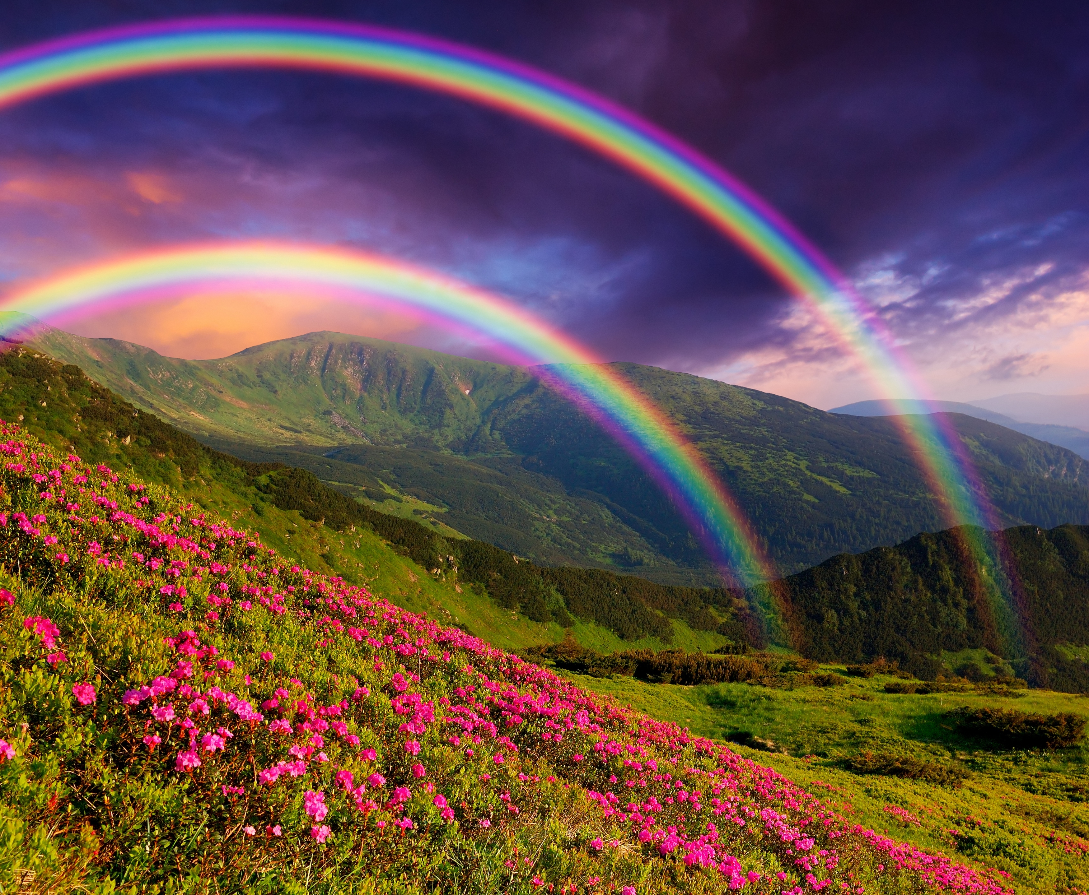 Double rainbow in the mountains