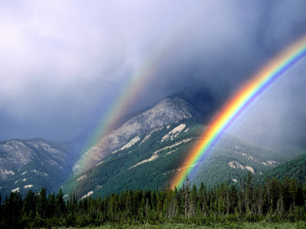 Double rainbow in the mountains