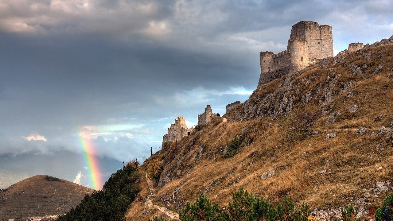 Rainbow and mountain fortress
