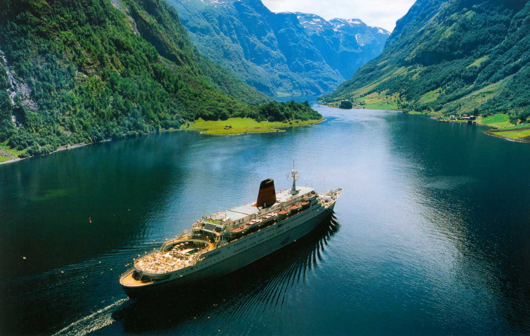 Cruise liner in the summer in the fjord in Norway