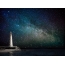 Photo: lighthouse on the background of the starry sky
