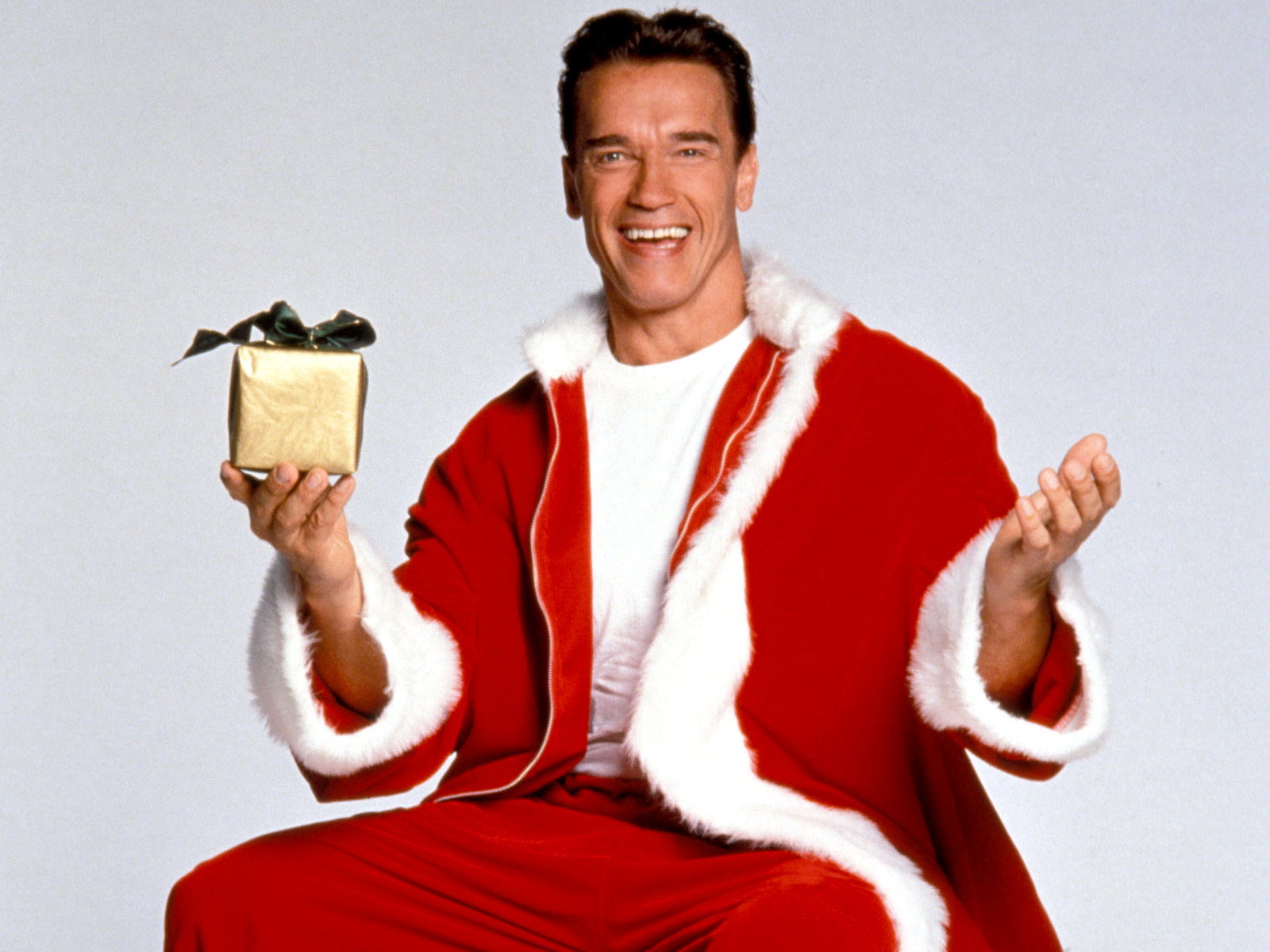 Foto Arnold Schwarzenegger minangka Santa Claus