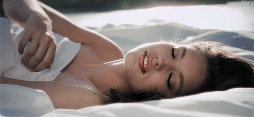 GIF picture: girl in bed