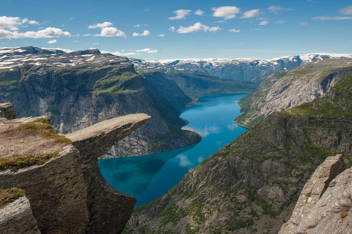 The Troll Language (in Norwegian Trolltunga) is a stone ledge on the Skieggedal Mountain, located near the city of Odda in Norway, towering over the Ringedalsvatn lake at an altitude of 700 meters