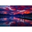 Foto di un tramonto su un lago di montagna